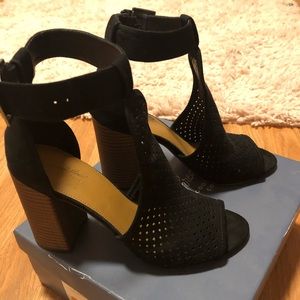 Black Open toe strap heels.